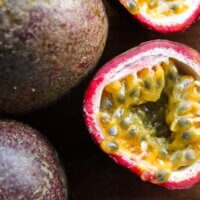 cut granadilla fruit on table
